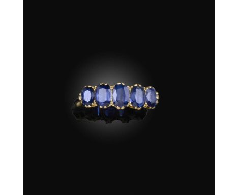 No reserve, a five-stone sapphire ring, set with five graduated cushion-shaped sapphires, mounted in gold, size S1/2, stamped