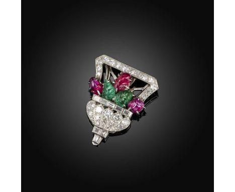 An Art Deco emerald, ruby and diamond clip brooch, 1930s, designed in the 'Tutti Frutti' style as a giardinetto of flowers, s