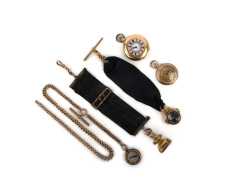 Two gold pocket watches and three gold fobs, late 19th/early 20th century, comprising: a gold and enamel pocket watch, length