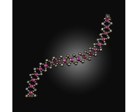 A ruby and diamond bracelet, late 19th century, of lattice design, set with cushion-shaped rubies and cushion-shaped and rose
