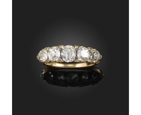 A five-stone diamond ring, late 19th century, set with a sequence of five cushion-shaped diamonds totalling approximately 2.0