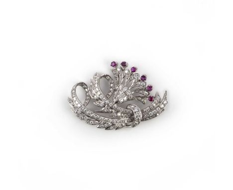 A ruby and diamond spray brooch, of openwork design set with circular-cut rubies and diamonds in platinum, length 4.6cm