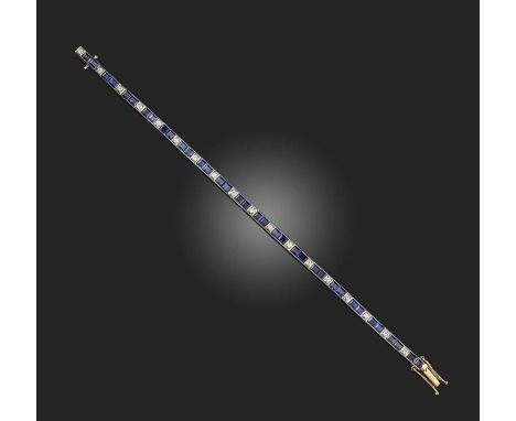 A sapphire and diamond line bracelet, designed as an articulated line of square step-cut sapphires spaced by brilliant-cut di