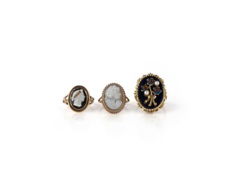 A group of three gold rings, comprising: two set with hardstone cameos depicting classical women in profile, size M1/2 each; 