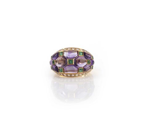 An amethyst, emerald and diamond ring, of bombé design, the front set with calibré-cut amethyst cabochons spaced by step-cut 