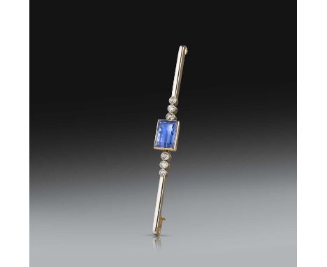 Vever, a sapphire and diamond brooch, early 20th century, of bar design, centring on a step-cut sapphire weighing 4.93 carats