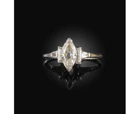 An Art Deco diamond ring, first half 20th century, set with an antique marquise-shaped diamond weighing approximately 0.70 ca