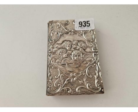 An Edwardian silver mounted prayer book, decorated with angels, 4.5 inches high, Birmingham 1903 by G&amp;C Ltd