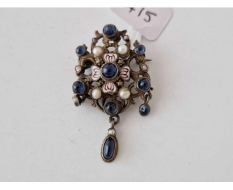 A Austro Hungarian silver enamel brooch set with sapphires and pearls