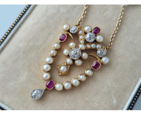 A GOOD QUALITY PEARL RUBY AND DIAMOND PENDANT NECKLACE SET IN GOLD 15 INCH 8.9 GMS BOXED