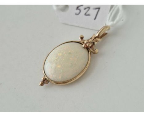 A opal mounted set pendant 9ct  