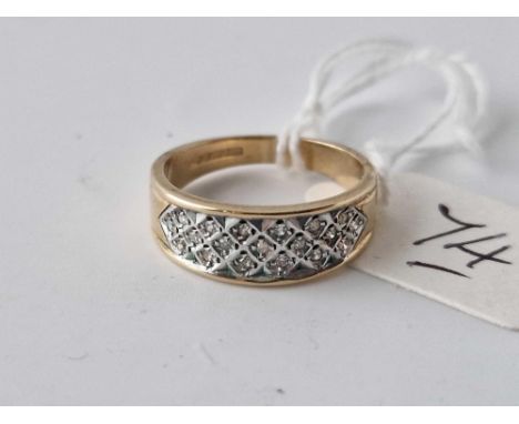 A diamond band ring in 9ct size K ½  2.8g