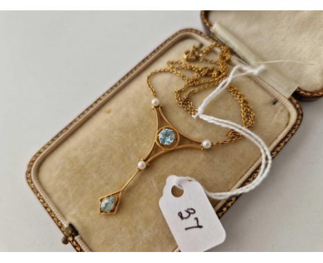 A pretty zircon and pearl pendant 15n inch