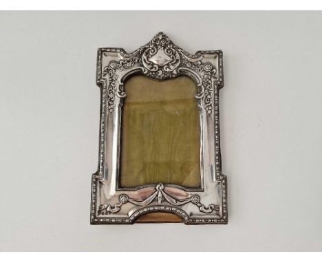 An architectural photo frame with decorated border, 9 inches high, Birmingham 1910 by RP DC
