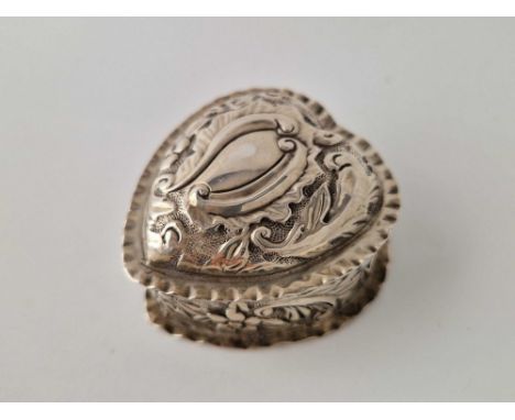 A 1888 silver heart shaped ring box