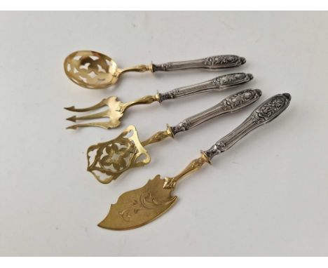 A set of four Continental silver handled serving spoons and forks