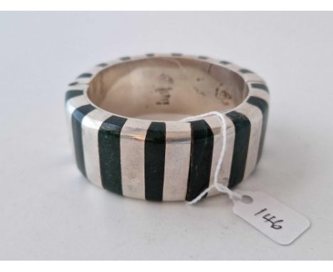 A heavy silver and jade cuff bracelet 146 gms
