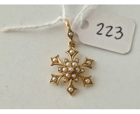 A Edwardian half pearl snowflake design pendant drop 15ct gold