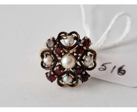 A fancy garnet and pearl ring 9ct size N 4.3 gms
