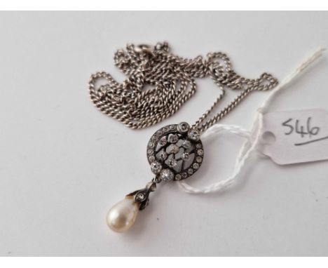 A circular pendant with pearl drop 24 inch