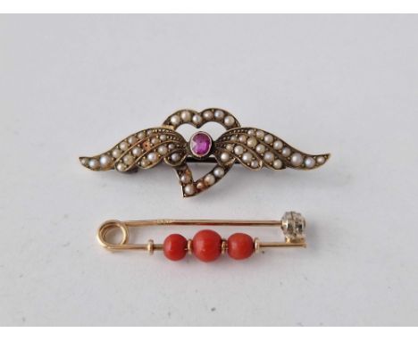 A 15ct gold coral bar brooch and 15ct gold ruby and seed pearl bar brooch