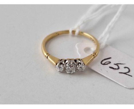 A three stone diamond ring 18ct gold size M 1.8 gms