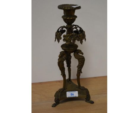 A 19th/20th Century French brass candlestick raised on tripod base, 29.5cm tall
damage to one flower droplet, one missing and