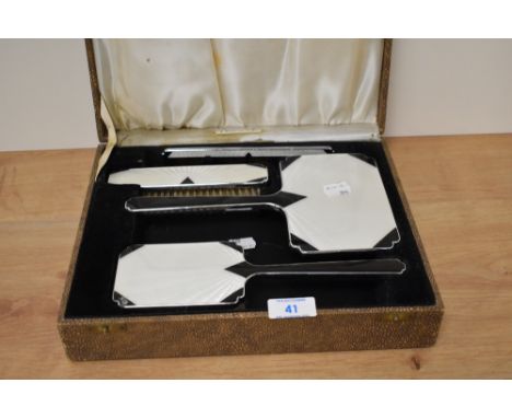 An Art Deco and guilloche enamel dressing table set in shagreen case
