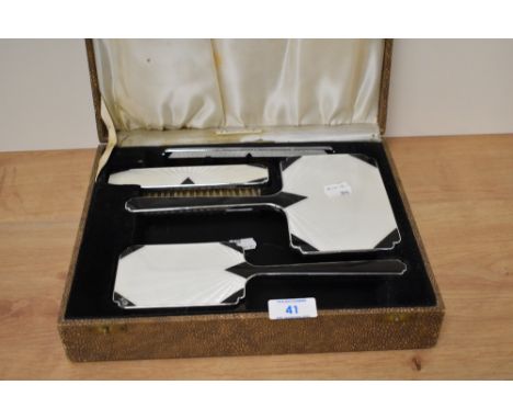 An Art Deco and guilloche enamel dressing table set in shagreen case