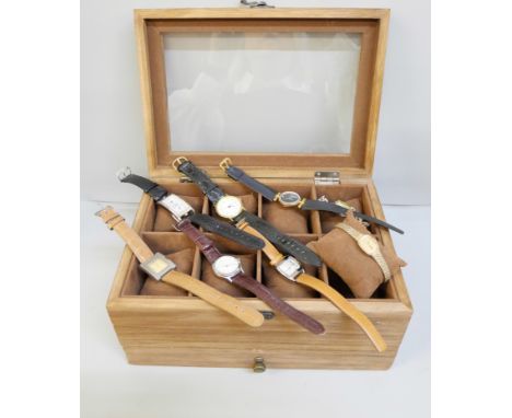 A collection of wristwatches including Swatch, together with a wooden watch display box
