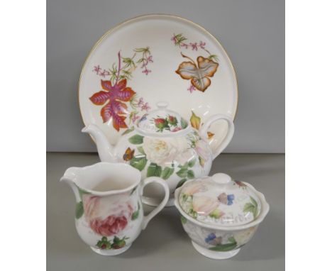 A collection of Royal Worcester comprising a teapot, milk jug, sugar bowl, same pattern and a shallow fruit bowl