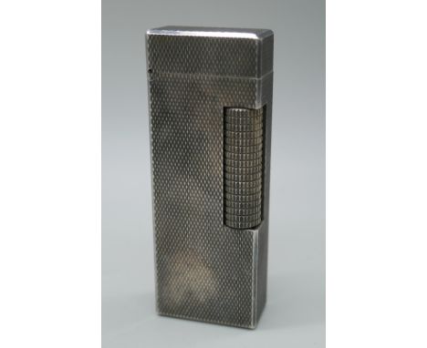 A Dunhill silver plated roller gas lighter 