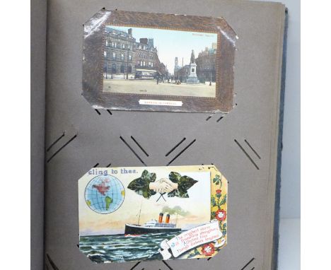 Postcards; a vintage postcard album and contents, 98 cards