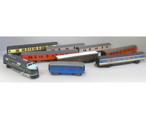 Eight OO gauge railway carriages including Hornby and Lima and a locomotive 