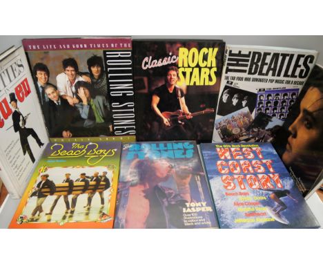 A collection of rock books including Velvet Underground, Queen and The Rolling Stones - 12 books