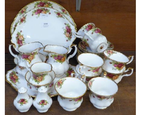 A collection of Royal Albert Old Country Roses tableware including tea plates, cups, saucers, bread and butter plates, etc.