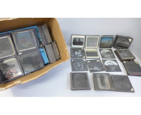 A box of glass lantern slides, various subjects including scenes from the Holy Bible 'Life of Jesus', world views, wildlife, 