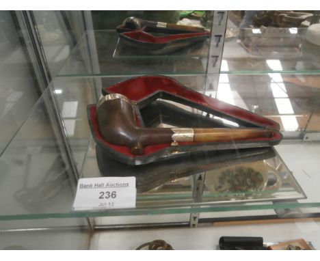 vintage pipe with hallmarked silver mounts in original leather case