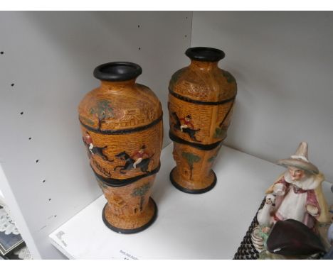 pair of stoneware hunting scene vases