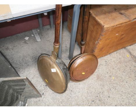 1 brass and 1 copper bed warmer