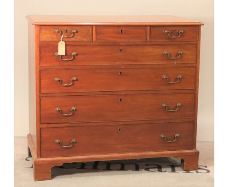 A late George III mahogany chestWith three short drawers over four long graduated drawers on bracket feet 111cm wide; 101cm h