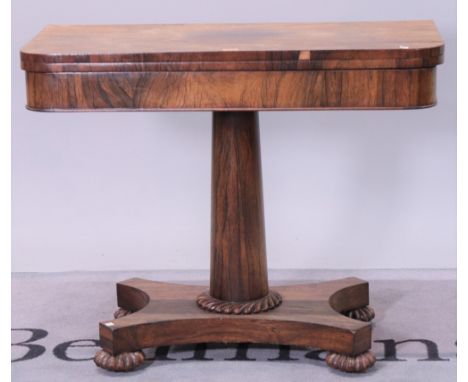 A William IV rosewood foldover card tableQuatrefoil base on bun feet 91cm wide; 73cm high