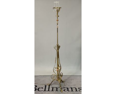 A late Victorian brass standard lampWith foliate decoration to the base 172cm high
