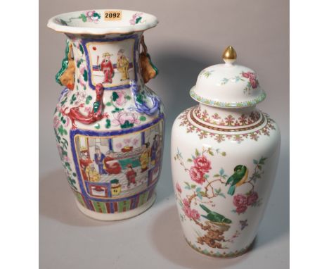 A modern Chinese baluster vase (2)Decorated with flowers and interior scenes 35cm high and another later ceramic lidded vase 