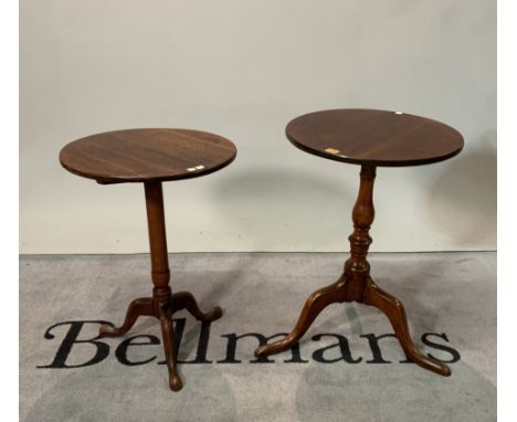 A 19th century oak tripod table (2)45cm diameter; 62cm high and another later mahogany tripod table 47cm diameter; 67cm high