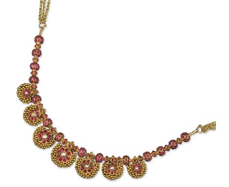 An Indian ruby and diamond-set gold necklace, the seven spherical pendants are each centred with a rose-cut diamond within a 