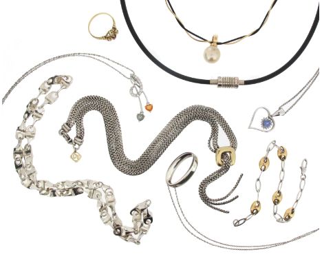 A mixed group of jewellery including a fancy link silver necklace, a ruby and diamond-set gold ring, an eliptical silver pend