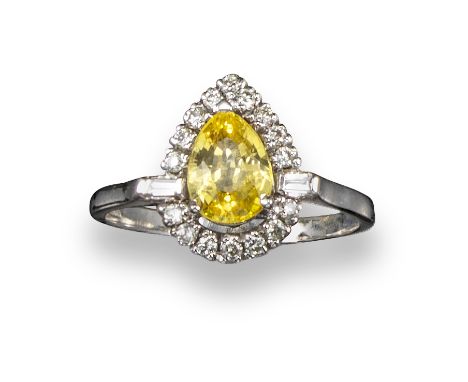 A yellow sapphire and diamond cluster ring, the pear-shaped sapphire set within a surround of round brilliant-cut diamonds an