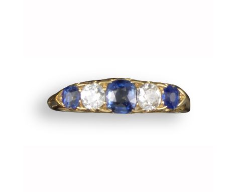 A Victorian sapphire and diamond five-stone ring, alternately-set with graduated sapphires and diamonds in carved and pierced