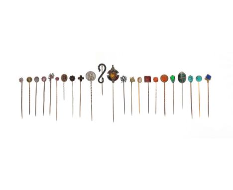 Twenty-three assorted stick pins, set with stones including a garnet, opal, ruby and turquoise From the collection of Bernard